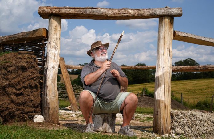 Veterans help rebuild the Bronze Age roundhouse

