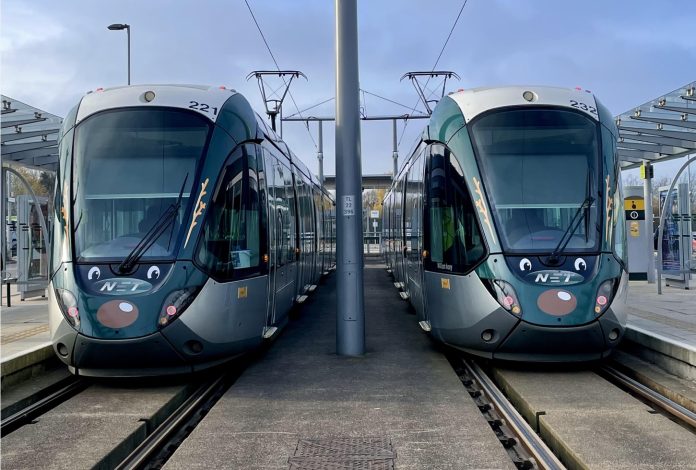 Trams transformed for Christmas with reindeer, robins and Santa
